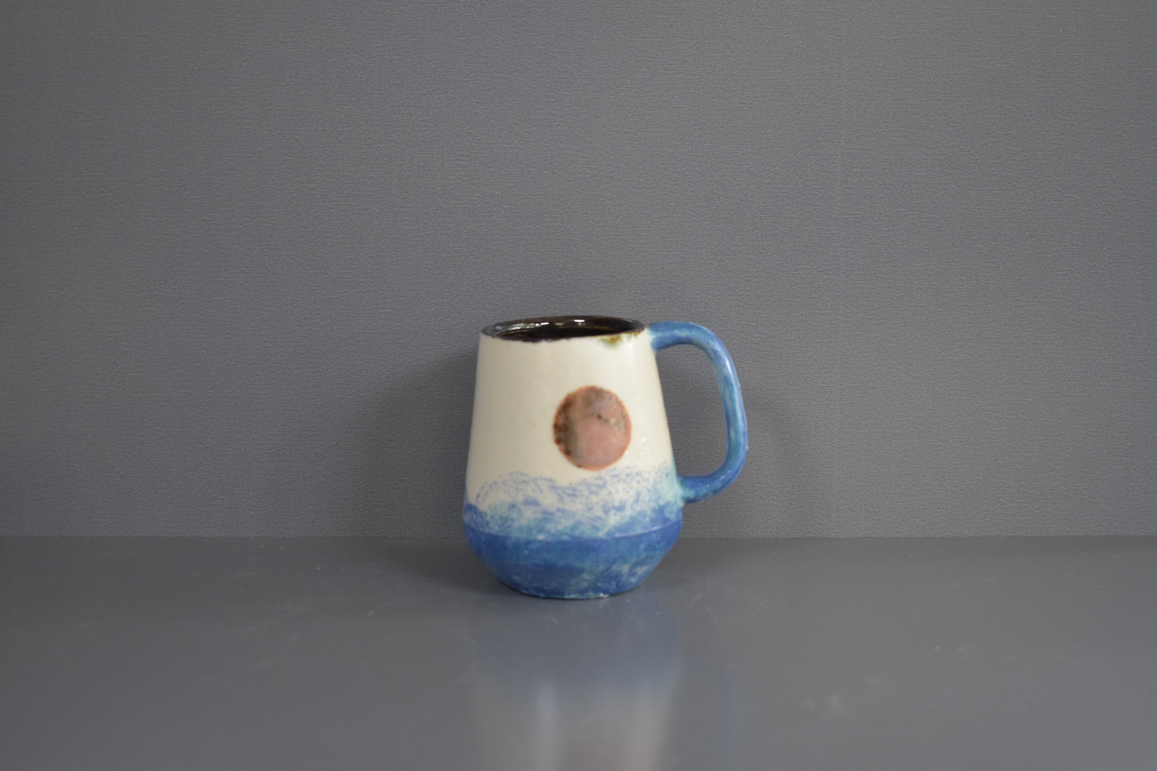 Morning Tide Mug – Handmade Ceramic Mug with Blue Wave Texture & Rising Pink Sun